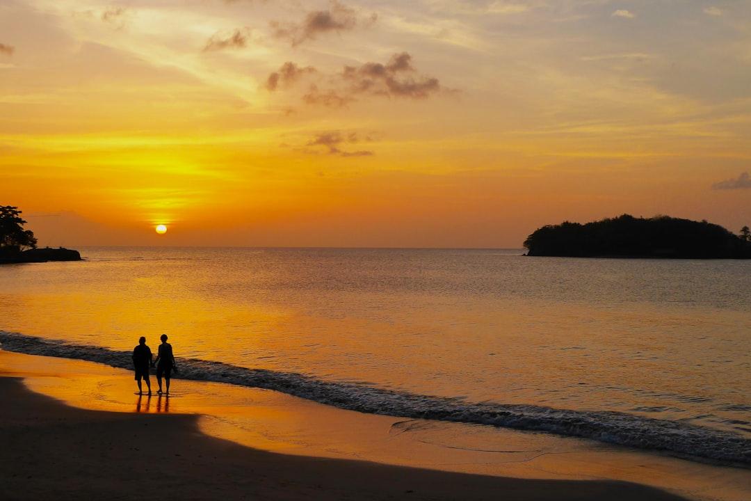 I had a wonderful week of rest and relaxation on the Caribbean island of St. Lucia.  The resort was near the capital of Castries.  One evening, I was waiting to go to the restaurant for my evening meal and as the sun set, I saw a couple walking along the shoreline.  I think the image summed up the idyllic feeling that the island gives you.