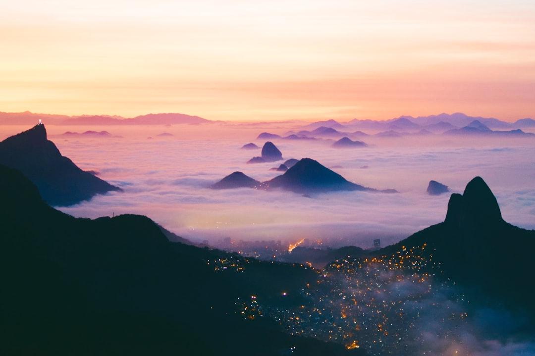 I took this sunrise shot early in the morning after camping atop Pedra da Gavea, a Rio landmark, last June. I loved the way that the sunrise turned the fog purple and pink. My friends and I were the only ones up there to witness, and that is probably the best sunrise I will ever see in my life. You can see some of Rio’s most famous landmarks in this photo- Christ the Redeemer (left), Sugarloaf Mountain (center), Dois Irmaos mountains (right), and Rocinha favela (bottom right). A perfect moment I’m thankful I was able to capture.