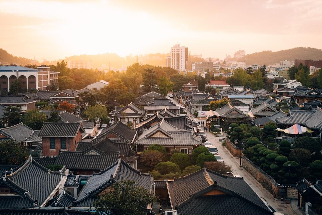 Look at the beautiful sunset view of Hanok Village. This is the most traditional place in Korea. It would be a must if I travel!