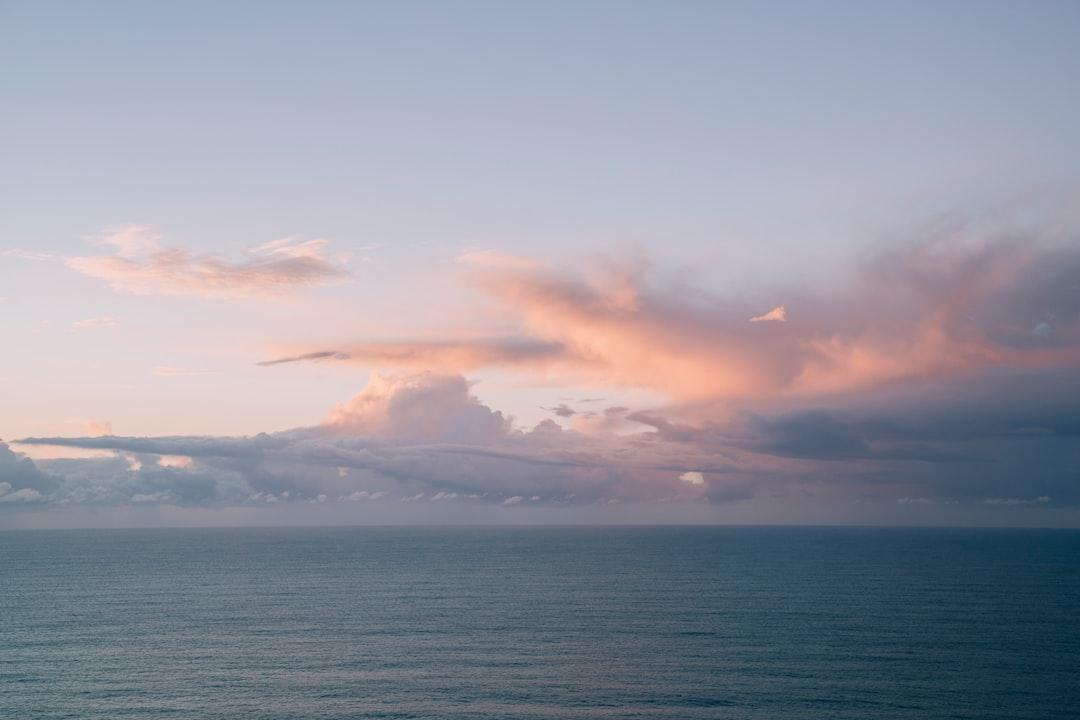 Pastel sunrise over the ocean in Byron, Australia.
