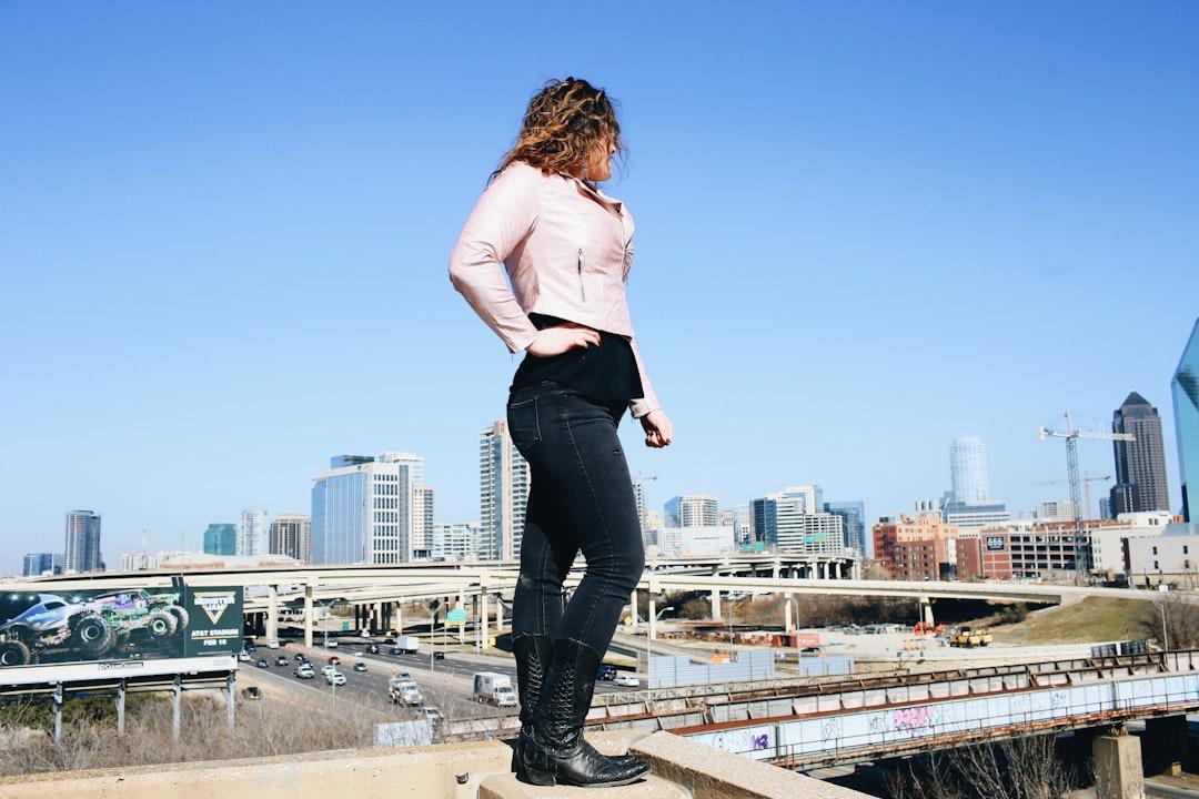 woman standing over city skyline
